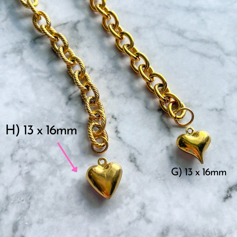 Gold stainless steel love pendant 3x /  hollow heart shape