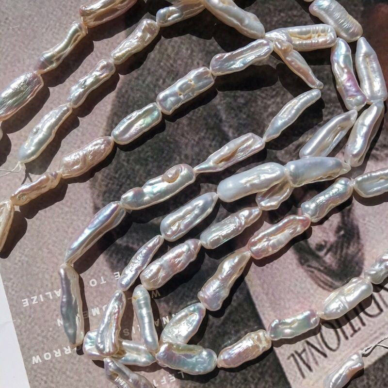 [1 strand] Elongated/ Biwa pearl - Freshwater pearls