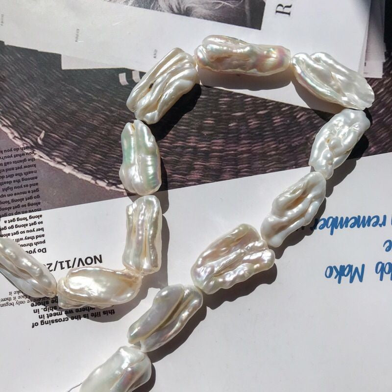 [1 strand] Elongated/ Biwa pearl - Freshwater pearls