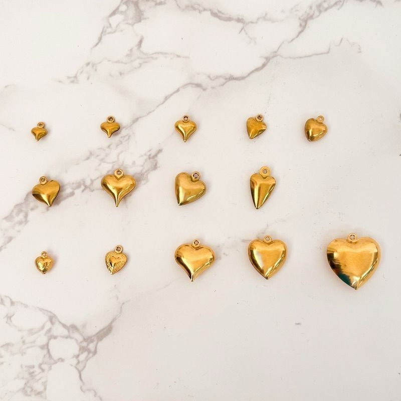 Gold stainless steel love pendant 3x /  hollow heart shape