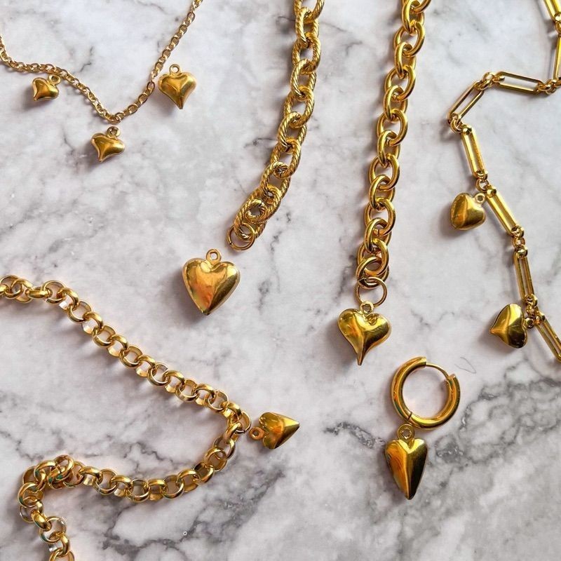 Gold stainless steel love pendant 3x /  hollow heart shape