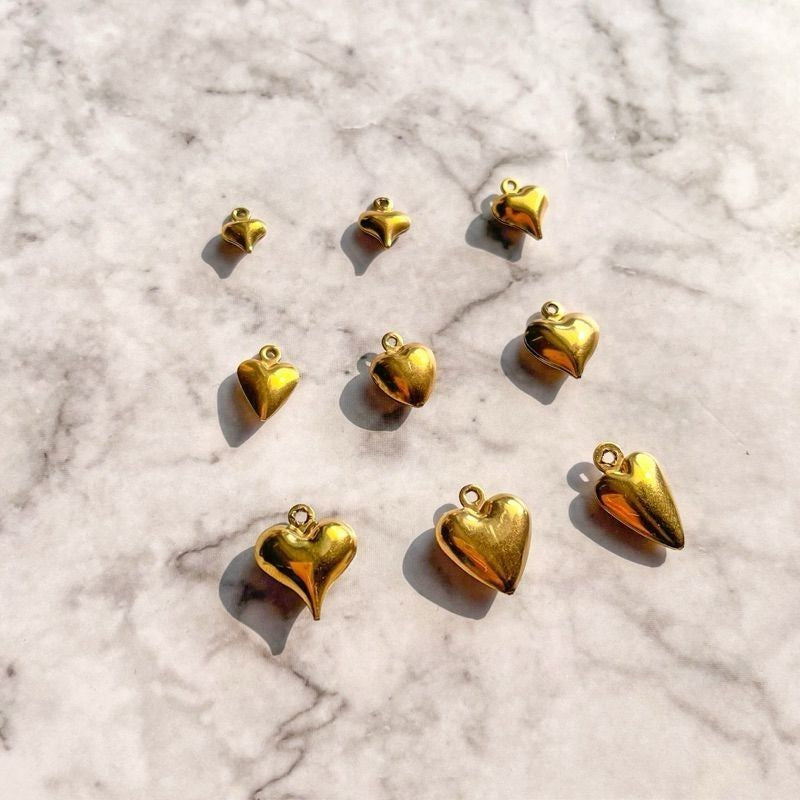 Gold stainless steel love pendant 3x /  hollow heart shape