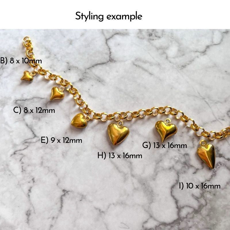 Gold stainless steel love pendant 3x /  hollow heart shape